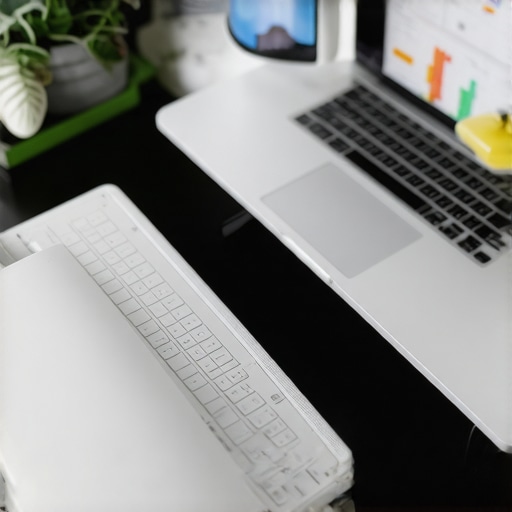 A workspace with laptop displaying local SEO analytics, review management dashboard, and marketing charts